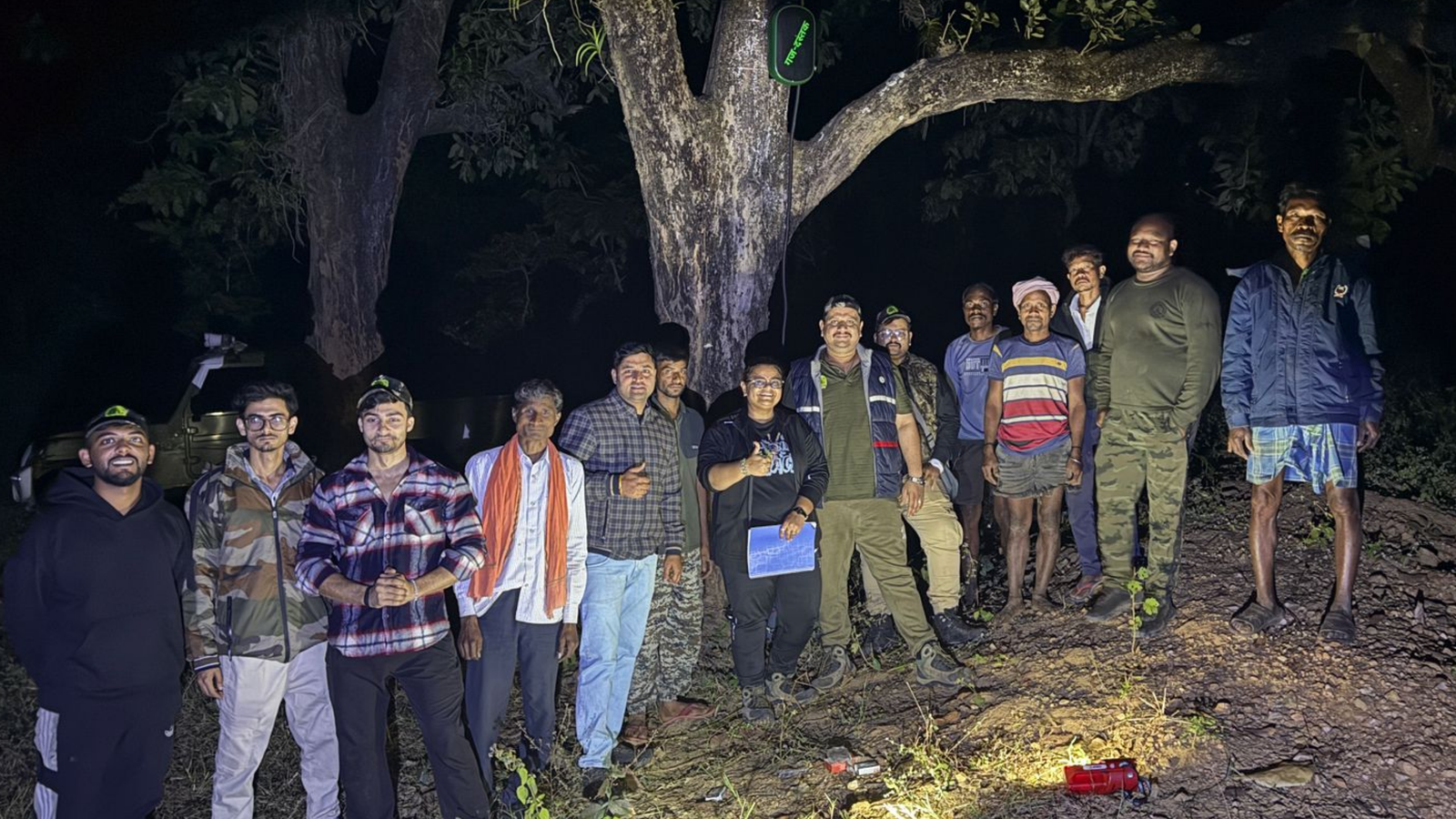 Team gathered during night field operations